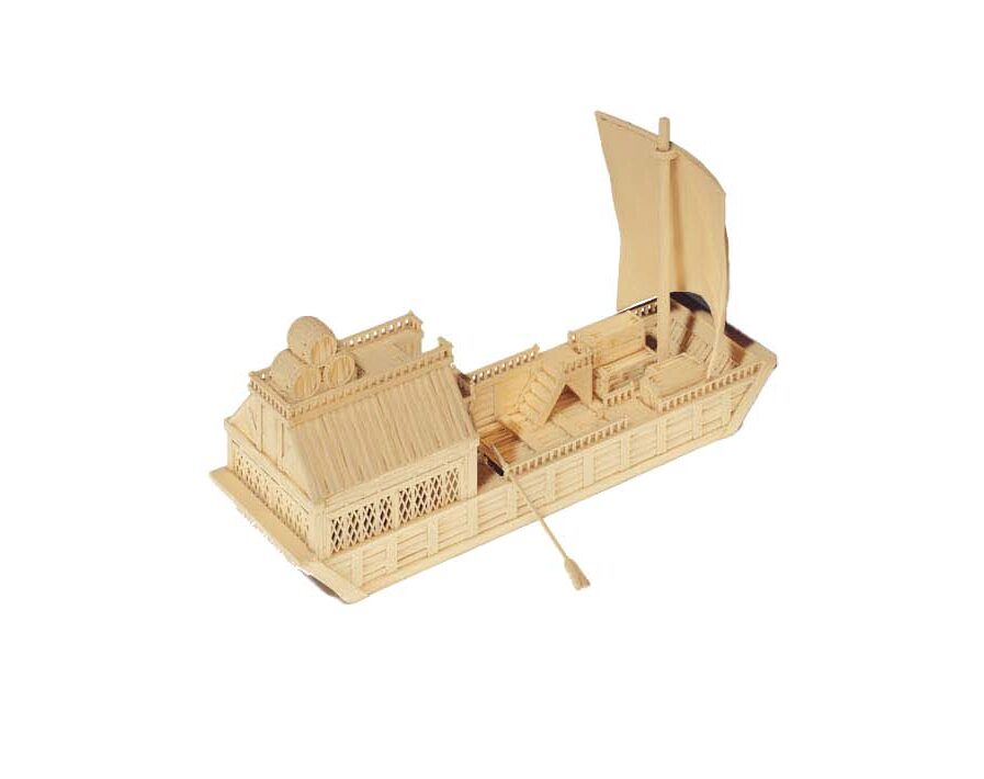 Kahn mit Haus und Segel